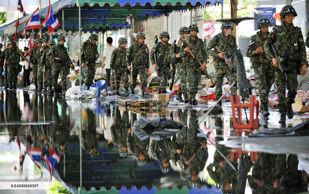 Thailand begins to count damage after troops smash protests