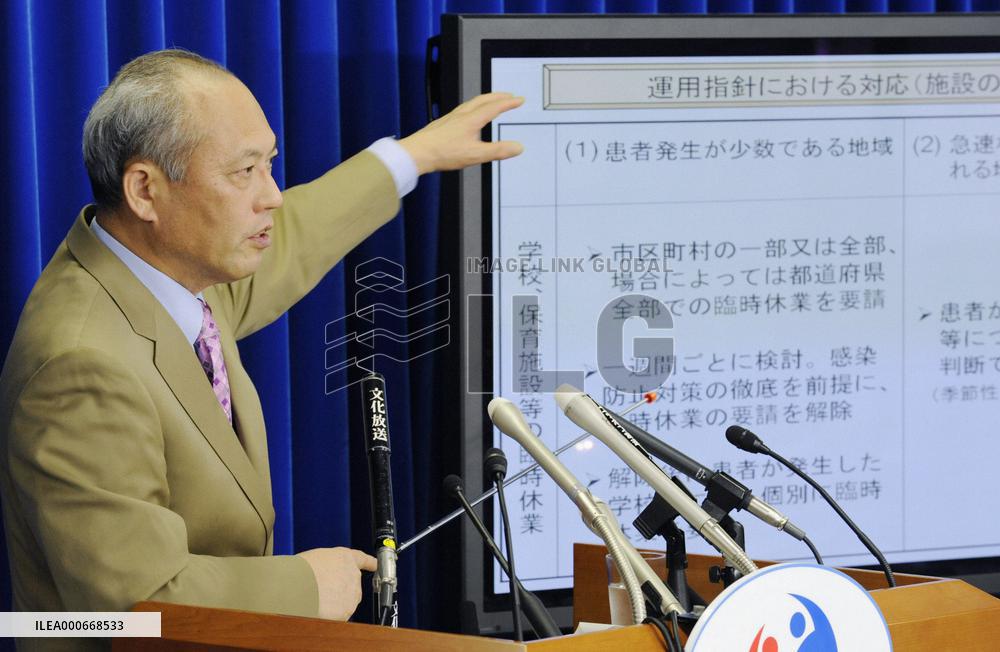 Japan revamps policy to tackle new flu
