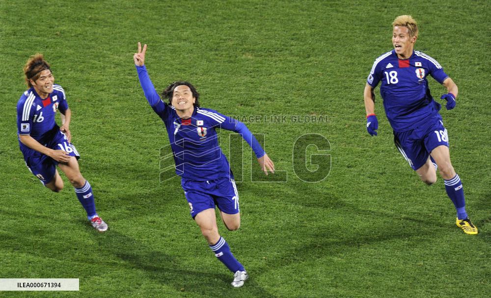 Japan overpower Denmark to cruise into last 16