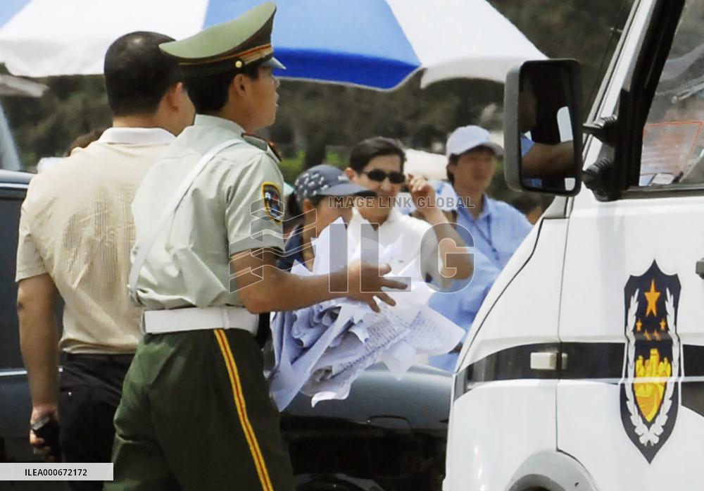 Police keep watch at Tiananmen Square on 18th anniversary