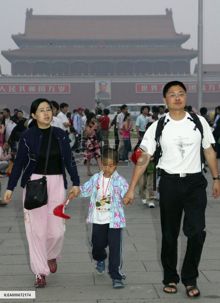Police keep watch at Tiananmen Square on 17th anniversary
