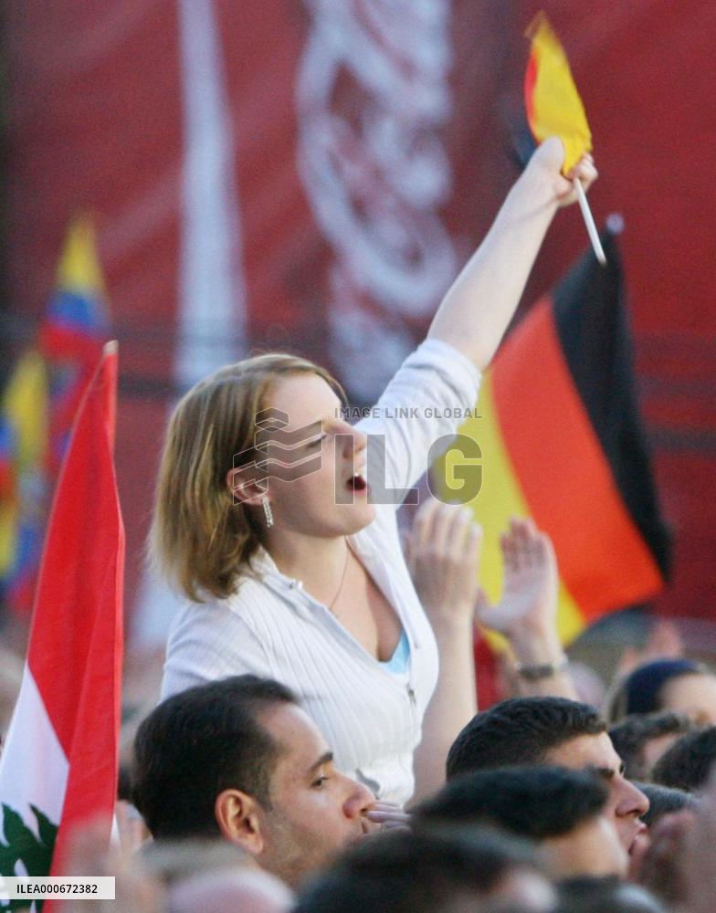 Supporters take part in 'soccer fan' party