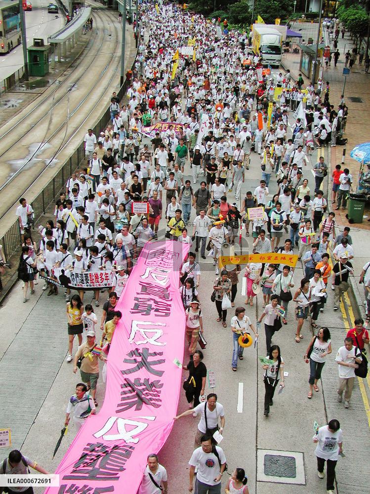 (CORRECTED)People mark H.K. handover anniversary