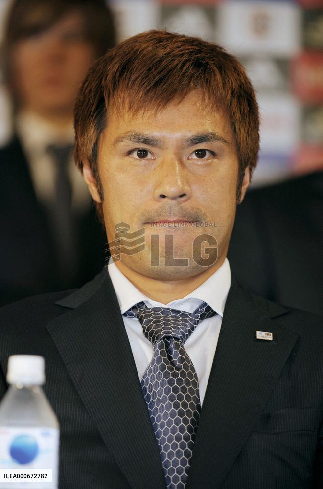 Japan's World Cup squad return home from South Africa