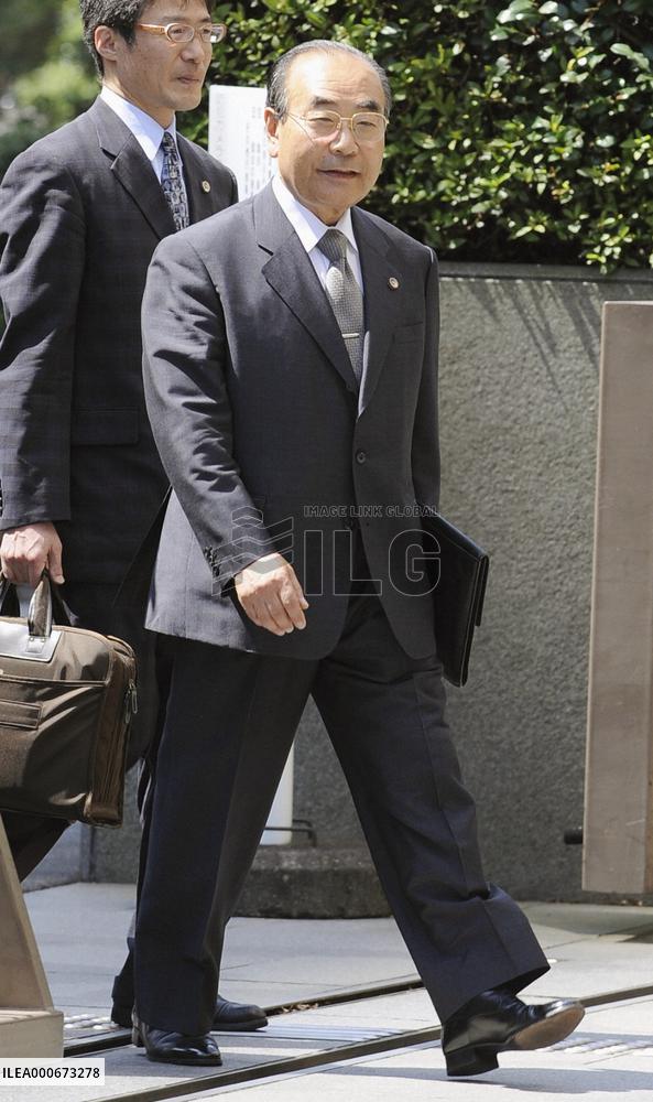 Ex-intelligence chief found guilty of fraud, but avoids prison