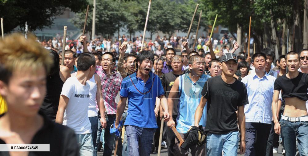 Curfew imposed in Xinjiang capital as violence grows