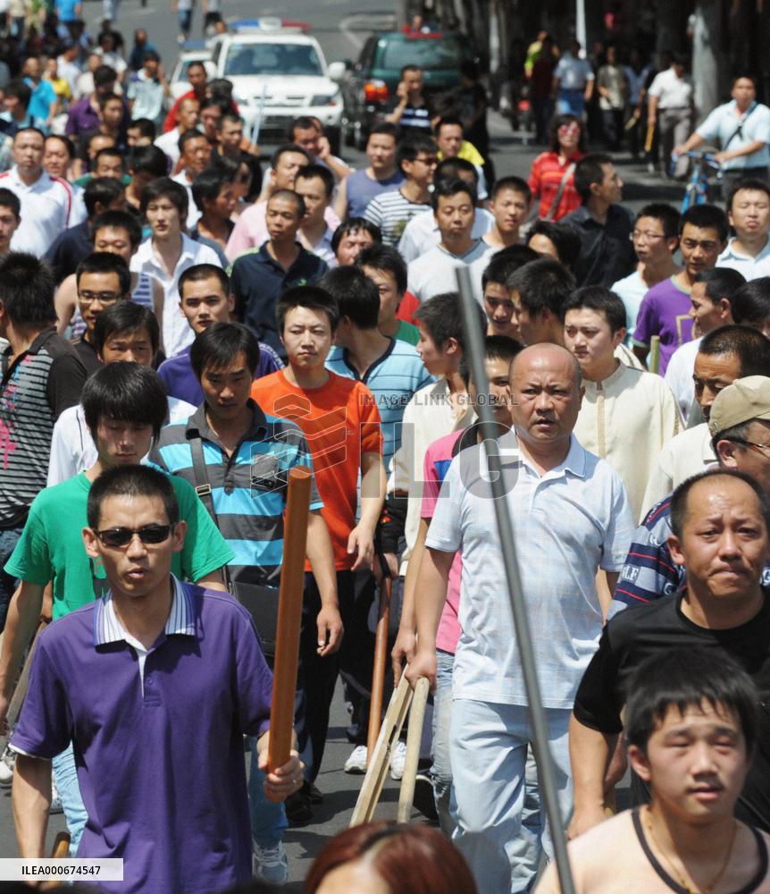 Curfew imposed in Xinjiang capital as violence grows