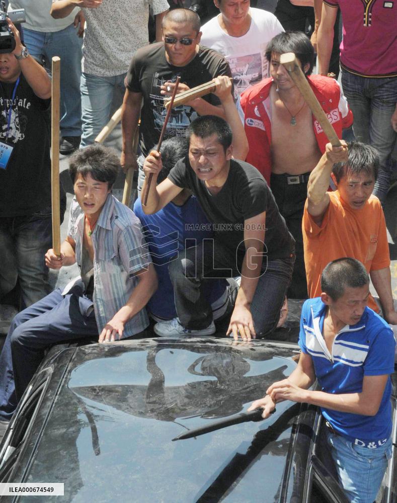 Curfew imposed in Xinjiang capital as violence grows