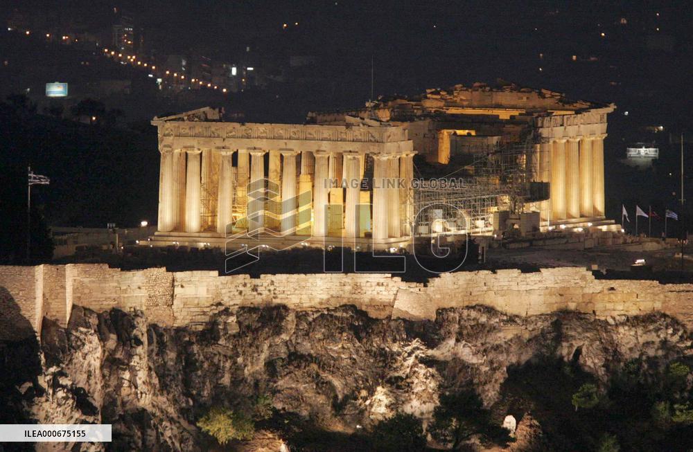 (1)Torch in Athens, Lewis carries flame toward Acropolis