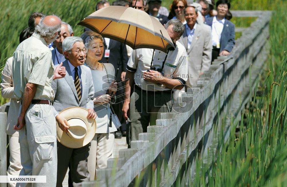 Japan imperial couple in Canadian wetland Mer Bleue