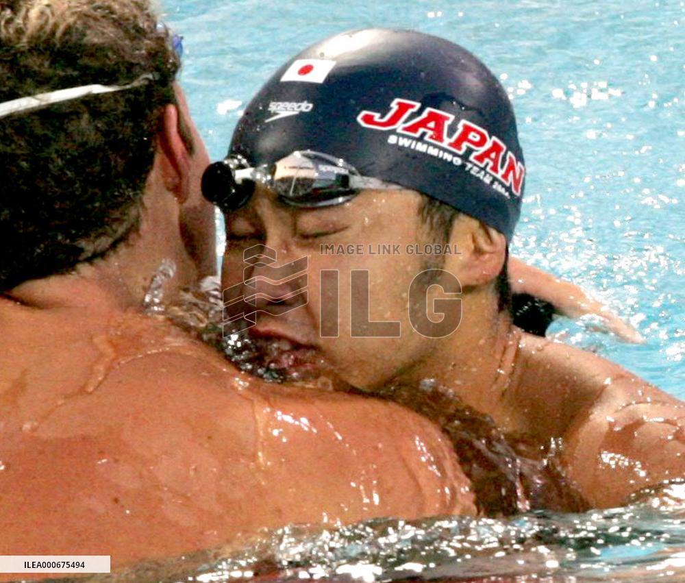 (3)Kitajima wins gold in 100m breaststroke