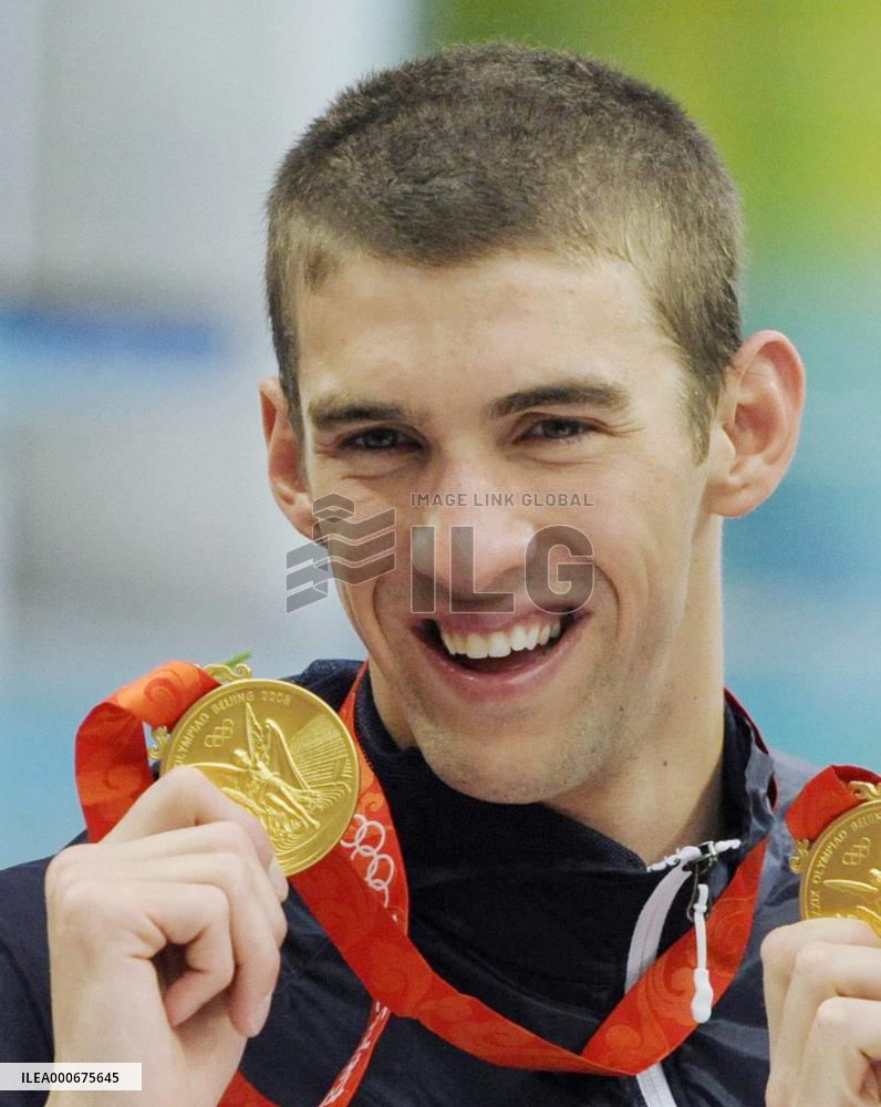 Olympics: Phelps grabs record 8th gold medal