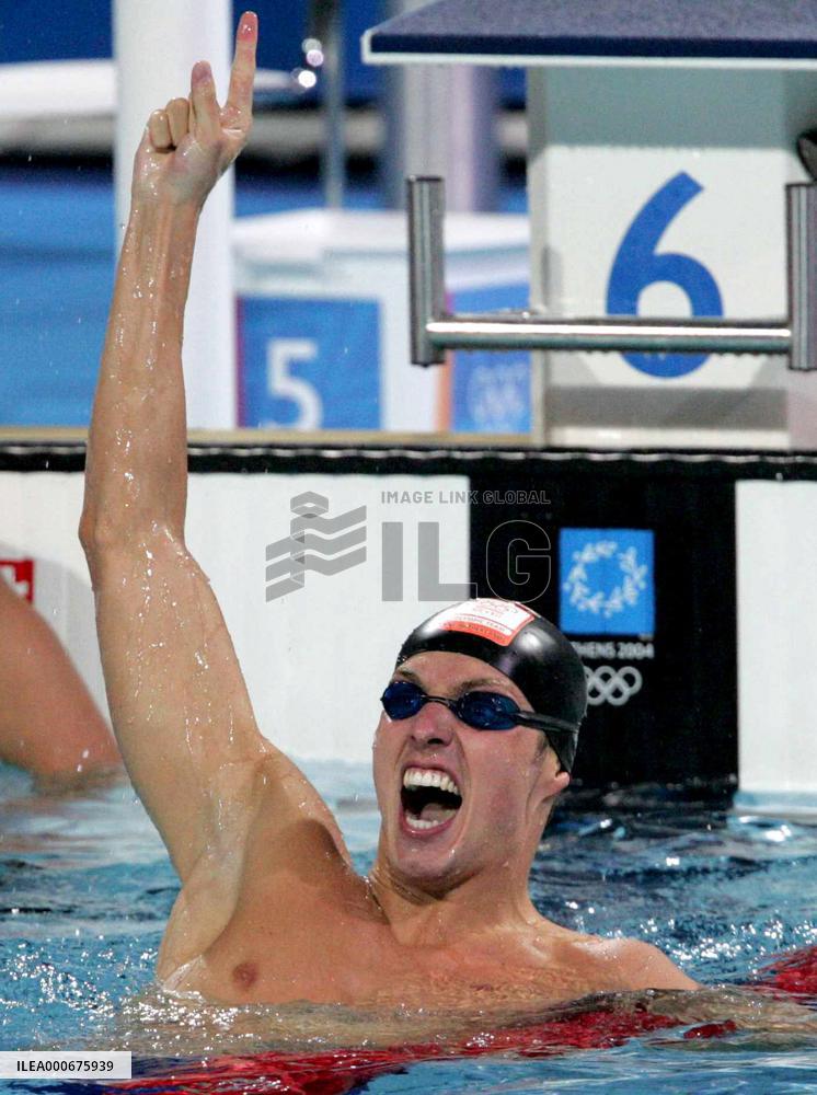 Van Den Hoogenband wins men's 100m freestyle