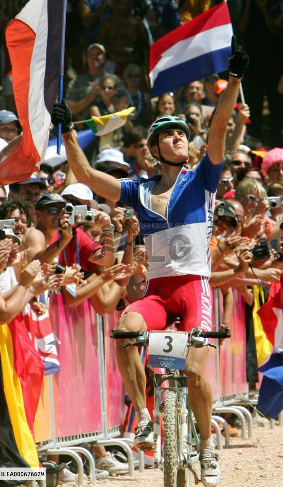 (1)France's Absalon wins men's cross country in Olympics