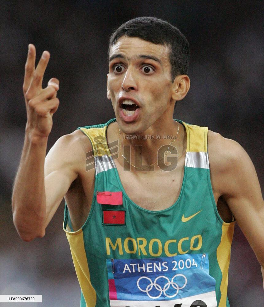(2)Morocco's El Guerrouj wins gold in men's 5,000 meters
