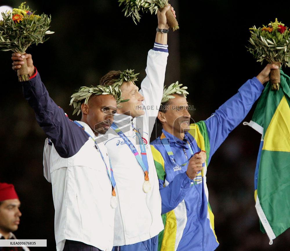 (4)Italy's Baldini wins men's marathon in Olympics