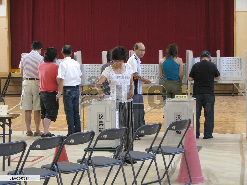 Voters line up at polling station