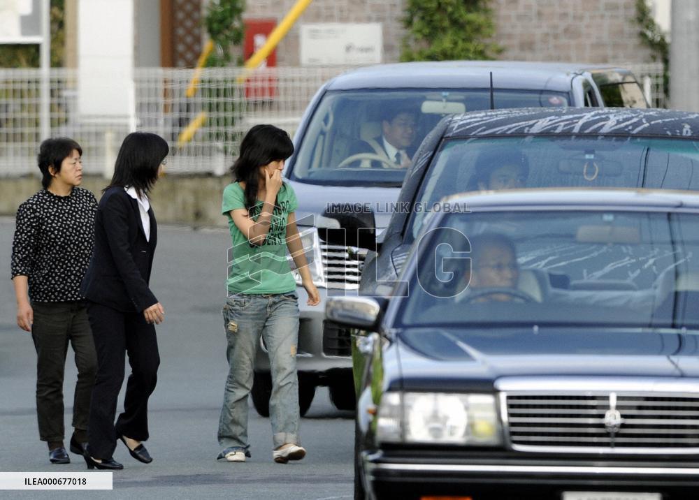 Remains of slain Japanese aid worker return home