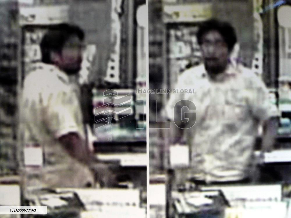 Osaka police release photos of suspected post office robber