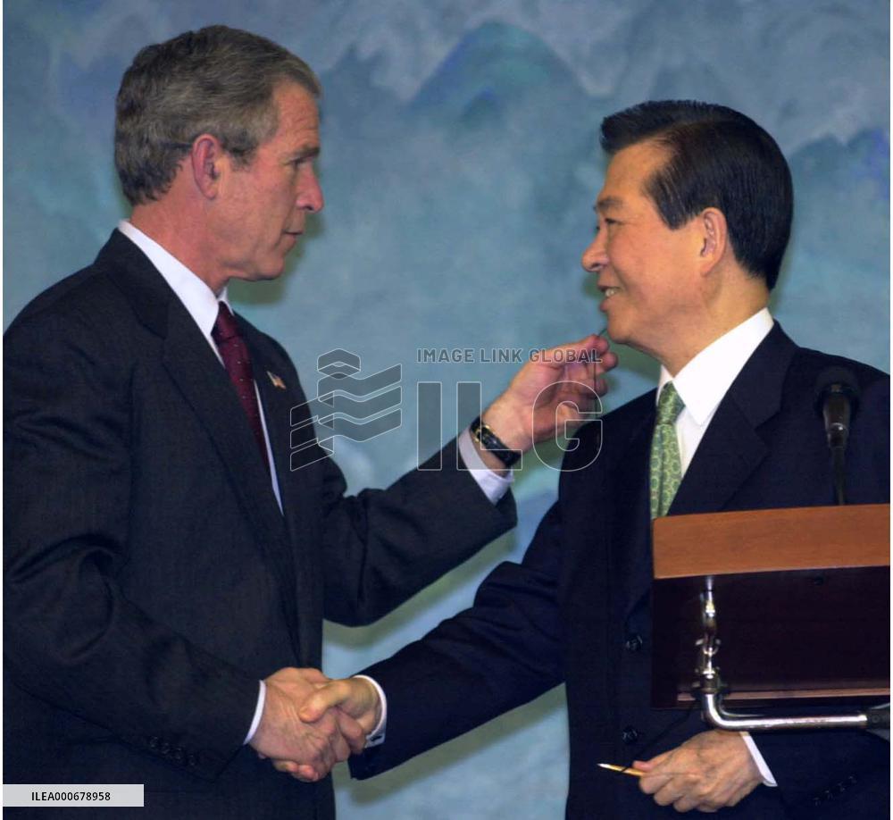 Bush reaffirms Kim's 'sunshine' policy
