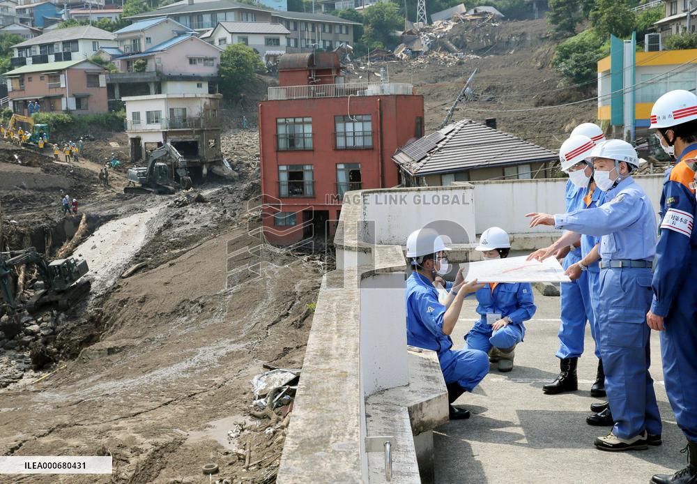 Japan PM Suga visits mudslide-hit Atami