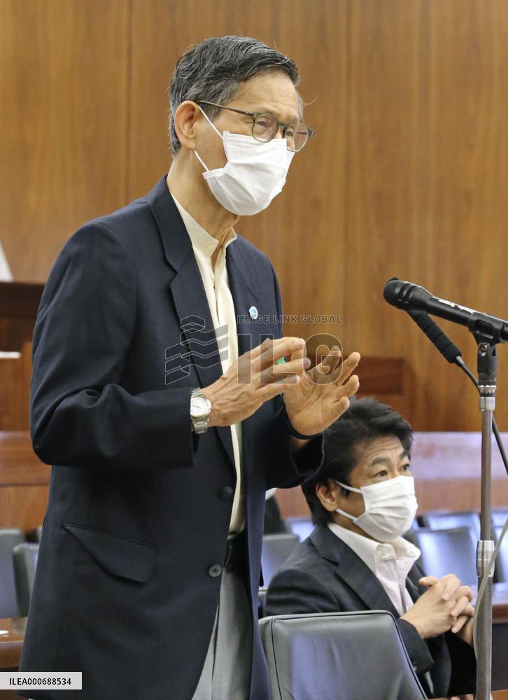 Japan's top COVID-19 adviser Omi