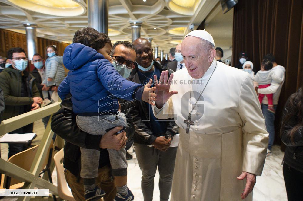 Pope spends name-day with poor receiving Covid-19 vaccine