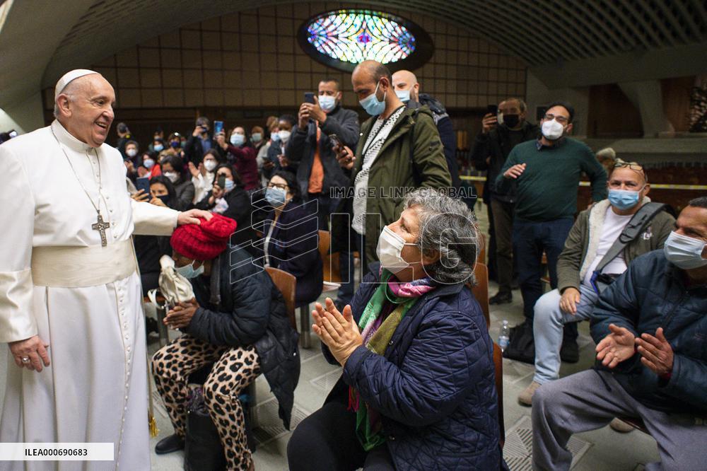 Pope spends name-day with poor receiving Covid-19 vaccine