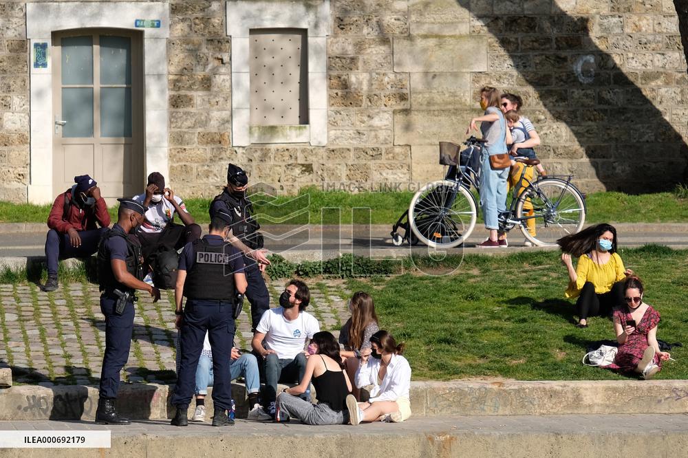 People Enjoying the Warm Weather Paris