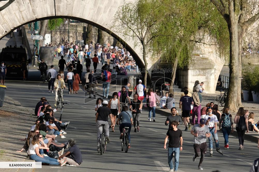 People Enjoying the Warm Weather Paris