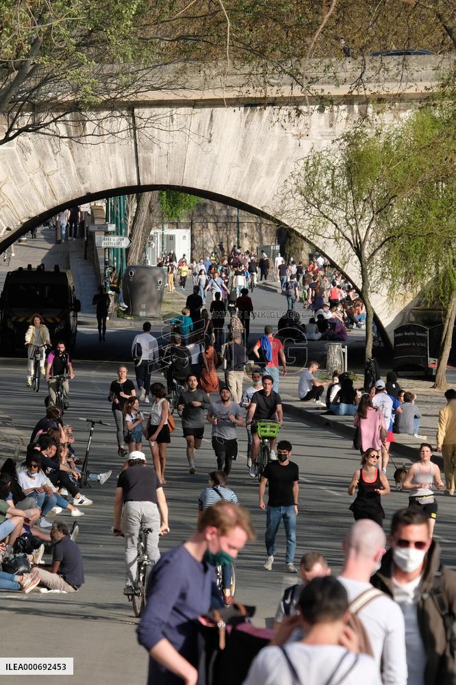 People Enjoying the Warm Weather Paris