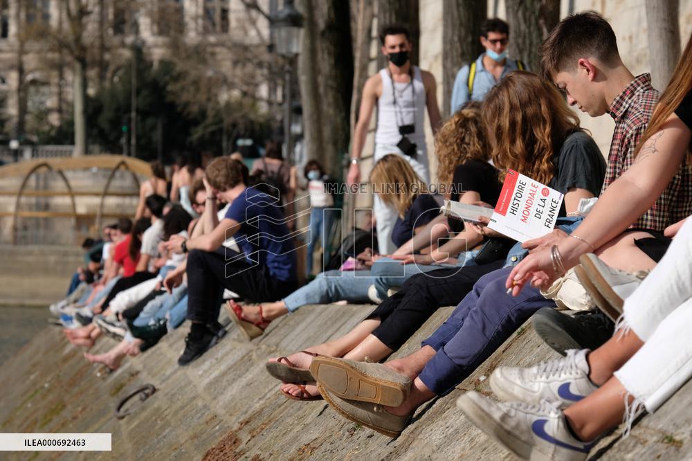 People Enjoying the Warm Weather Paris