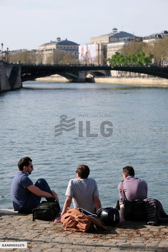 People Enjoying the Warm Weather Paris