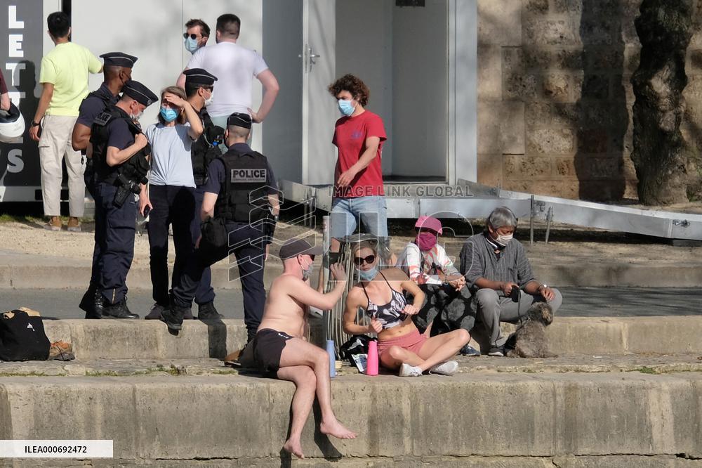 People Enjoying the Warm Weather Paris
