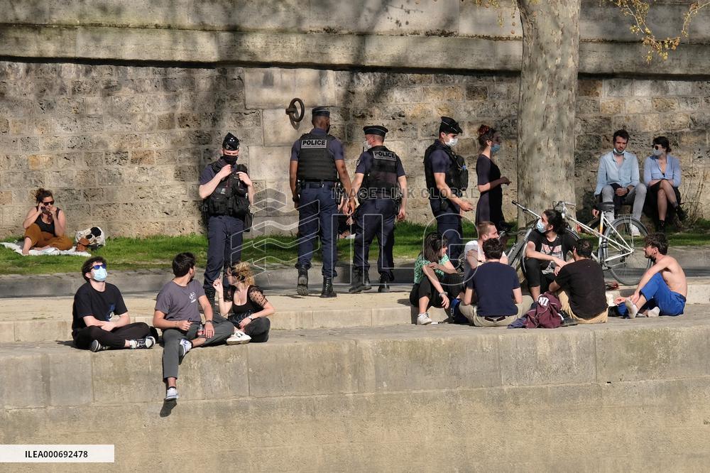 People Enjoying the Warm Weather Paris