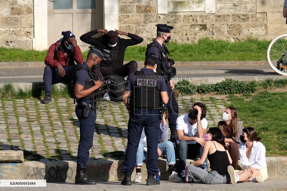 People Enjoying the Warm Weather Paris