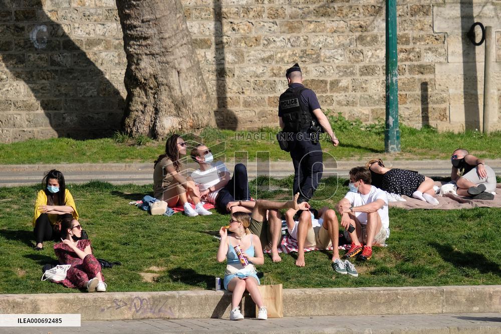 People Enjoying the Warm Weather Paris