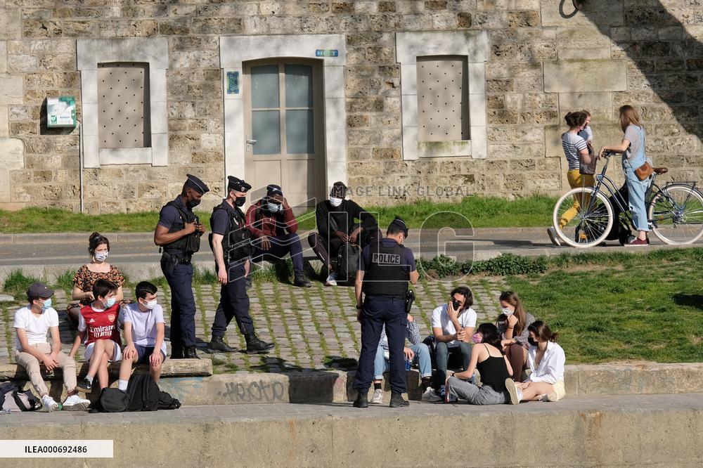 People Enjoying the Warm Weather Paris