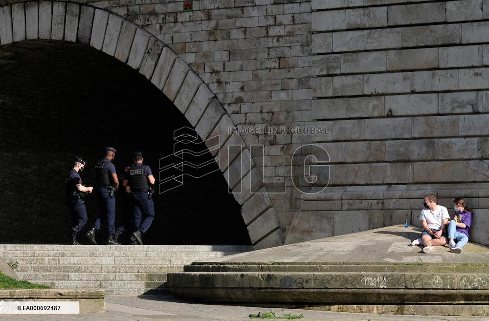 People Enjoying the Warm Weather Paris