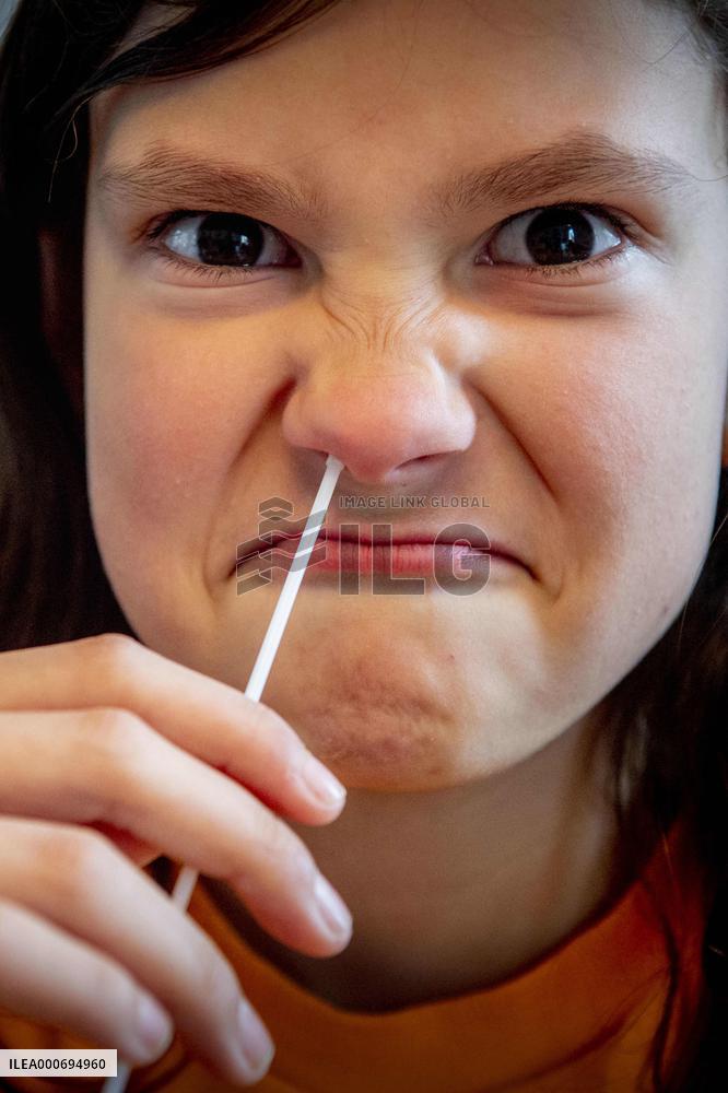 Corona Self-Test At Home With A Nasal Swab In His Nose - Rotterdam