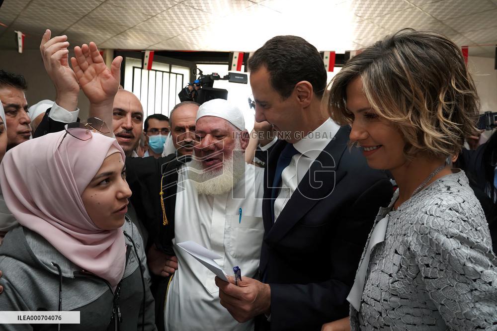 Bashar and Asma Al Assad Vote for Presidential Election - Douma