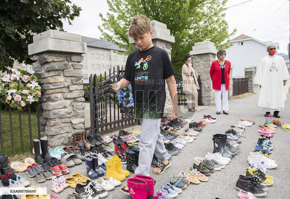 Memorial growing to honour 215 children buried at residential school site