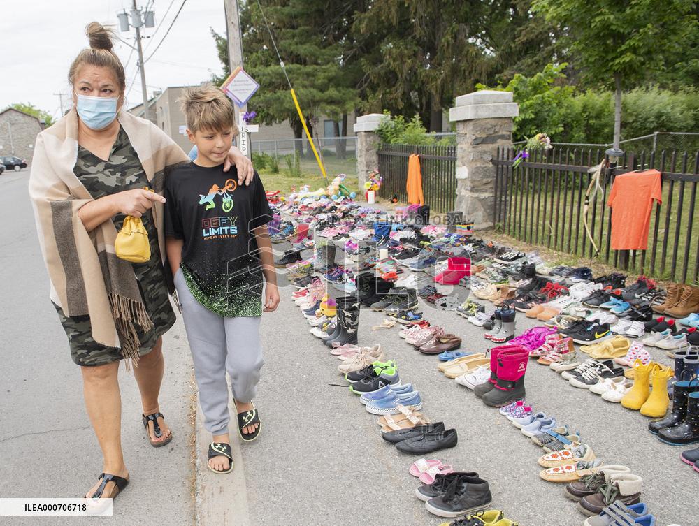 Memorial growing to honour 215 children buried at residential school site