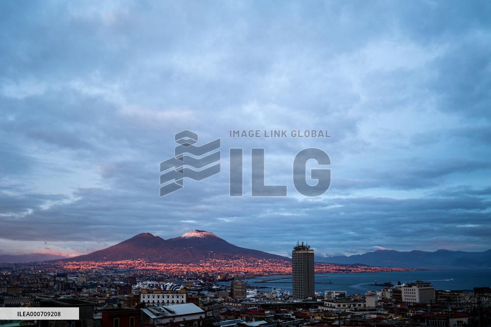 The snowy Vesuvius at sunset - Naples