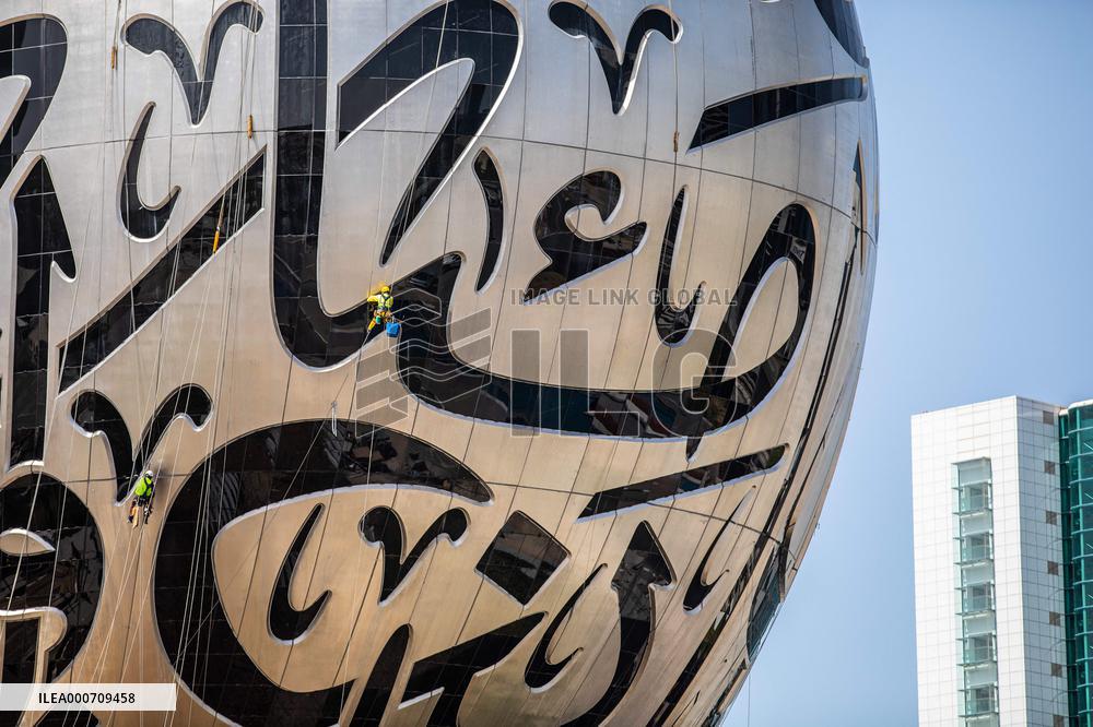 Workers clean the Museum of the Future - Dubai