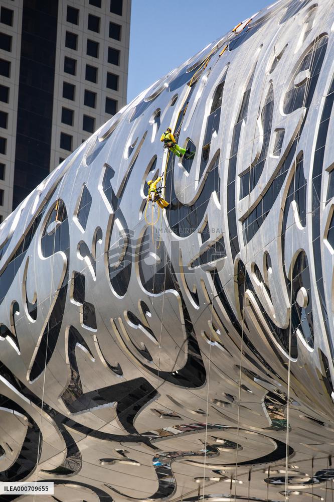 Workers clean the Museum of the Future - Dubai