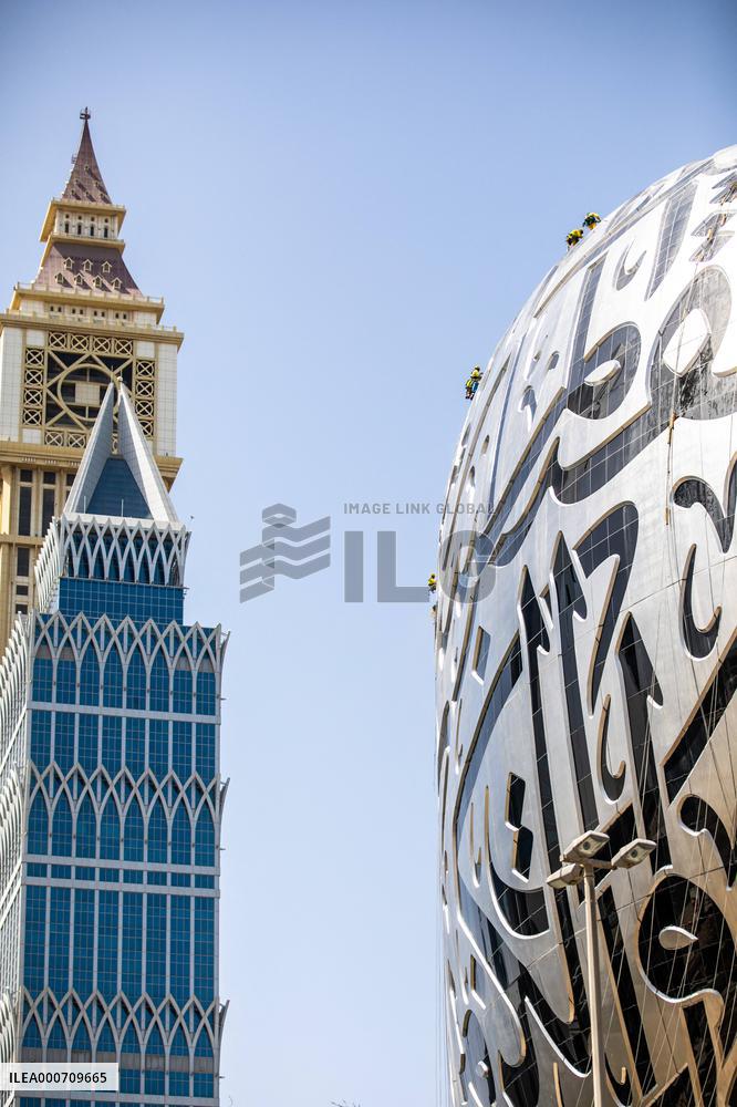 Workers clean the Museum of the Future - Dubai