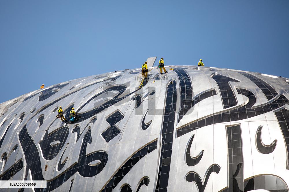 Workers clean the Museum of the Future - Dubai