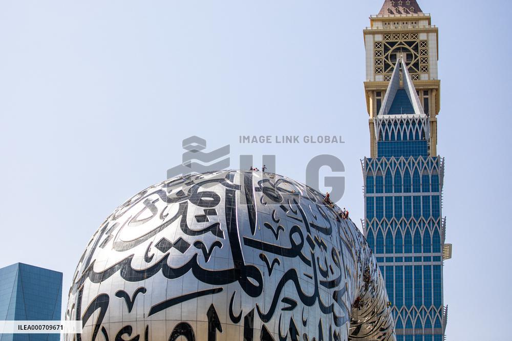 Workers clean the Museum of the Future - Dubai