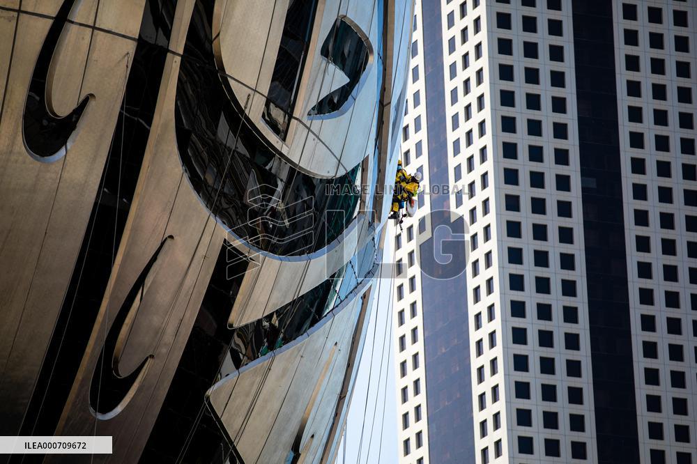 Workers clean the Museum of the Future - Dubai